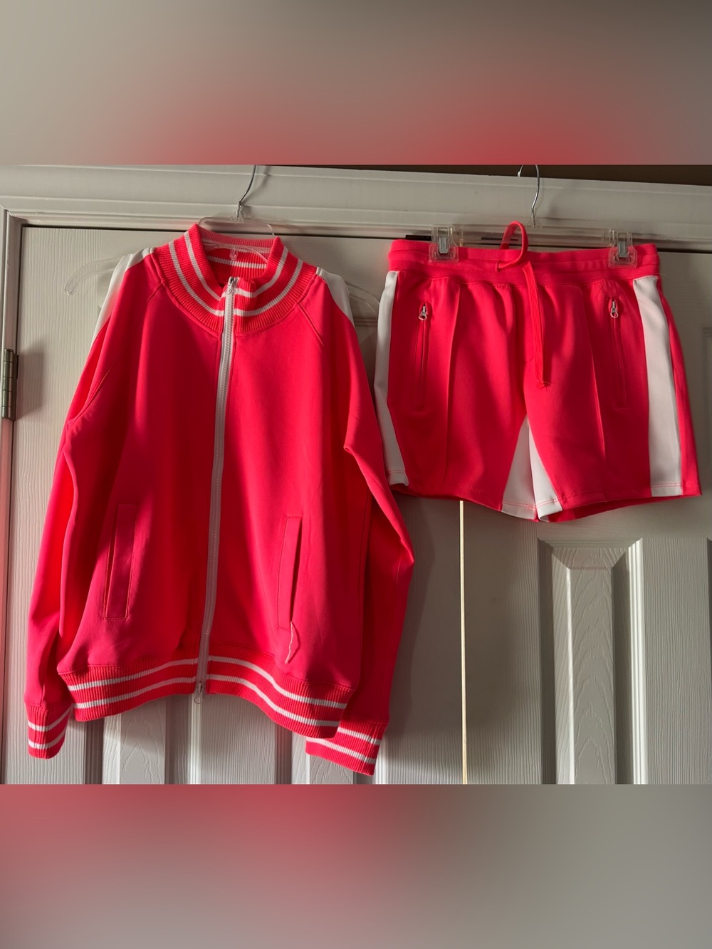 Neon Coral Two-Piece Track Jacket with cold shoulders & Shorts Set